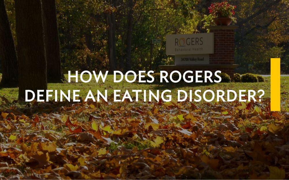 Text over an outdoor scene, reading"How does Rogers define an eating disorder."